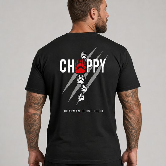 Male model wearing black John Chapman Chappy shirt back graphic view