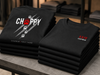folded black Chappy Combat Controller shirts stacked mockup