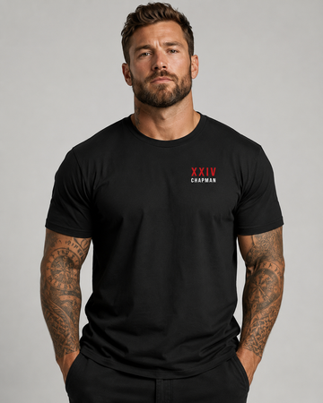 Male model wearing vintage black John Chapman Chappy Combat Controller shirt front view