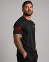 Male model side view wearing black Chappy Combat Controller shirt